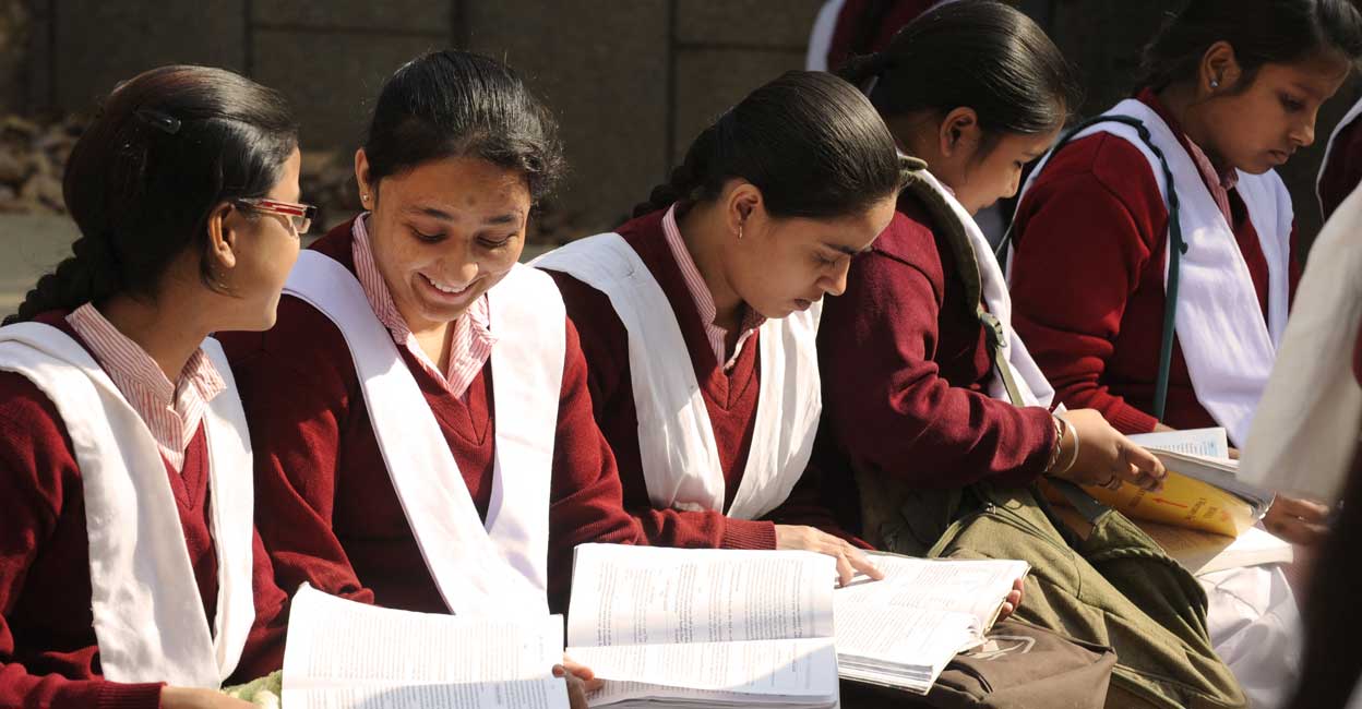 CBSE Exam Students (Photo by RAVEENDRAN / AFP)